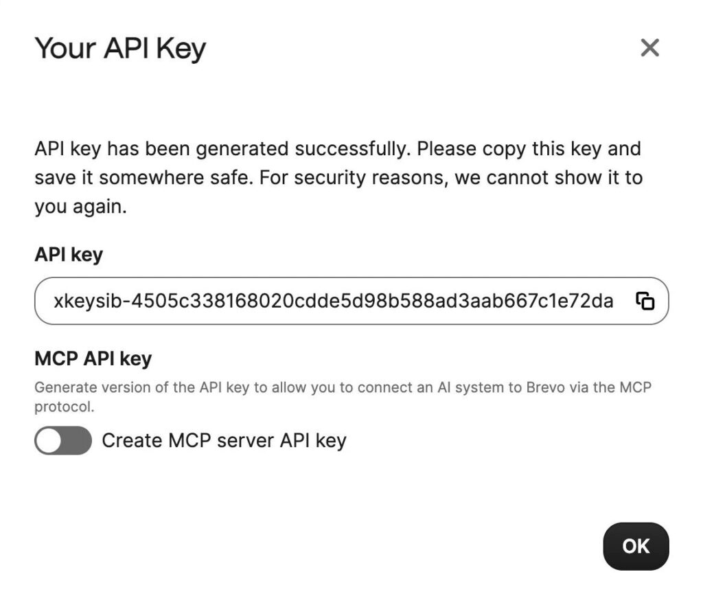 Brevo dialog showing a newly generated API key with a copy button